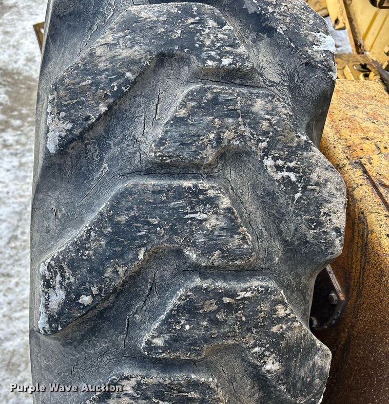 image for item DQ1081 1990 John Deere 770 motor grader