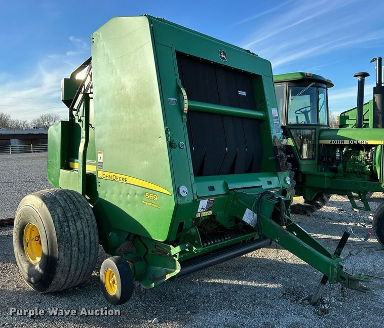 image for item OM9755 John Deere  569 Mega Wide Plus round baler