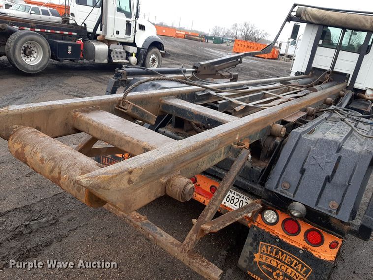 image for item DV9757 2007 Mack CV713 roll-off container truck