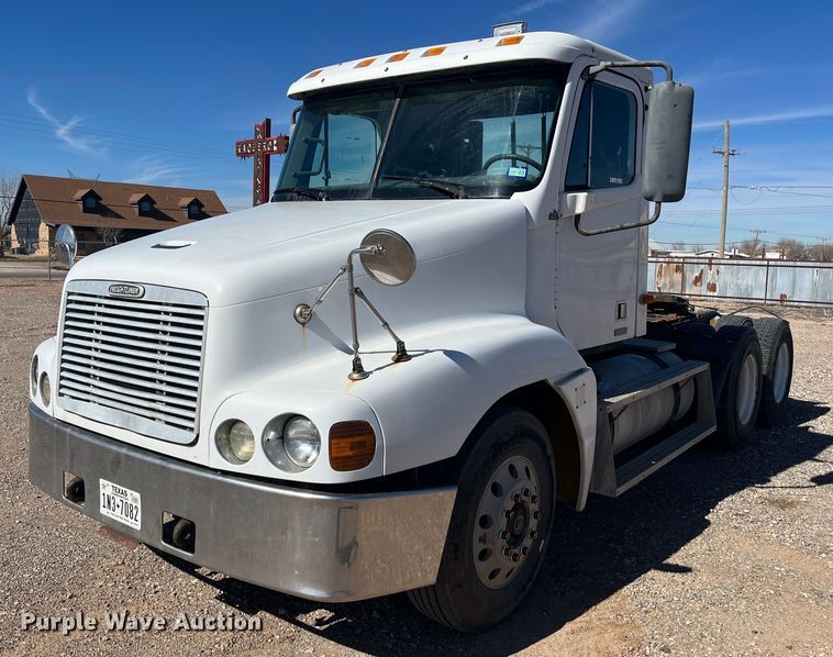 image for item EI0609 2000 Freightliner FLC120 semi truck