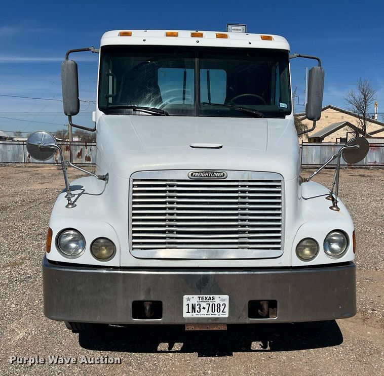 image for item EI0609 2000 Freightliner FLC120 semi truck