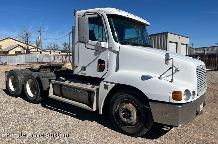 image for item EI0609 2000 Freightliner FLC120 semi truck