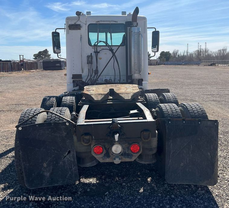 image for item EI0609 2000 Freightliner FLC120 semi truck