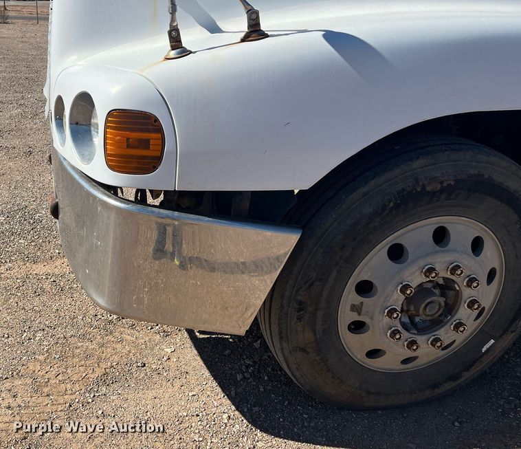 image for item EI0609 2000 Freightliner FLC120 semi truck