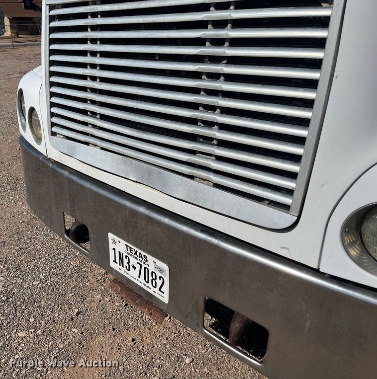 image for item EI0609 2000 Freightliner FLC120 semi truck