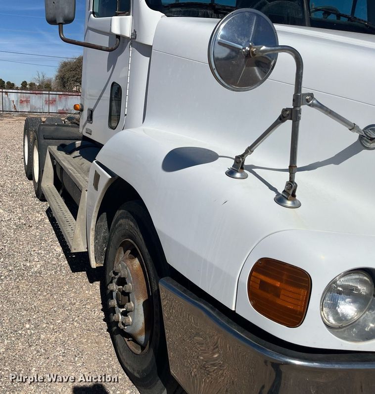 image for item EI0609 2000 Freightliner FLC120 semi truck