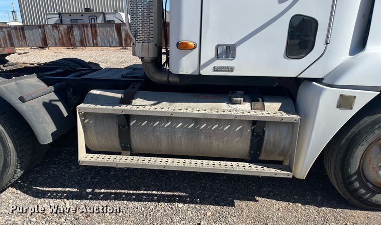 image for item EI0609 2000 Freightliner FLC120 semi truck