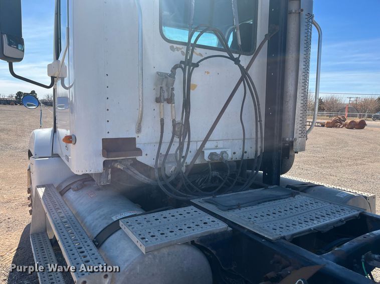 image for item EI0609 2000 Freightliner FLC120 semi truck