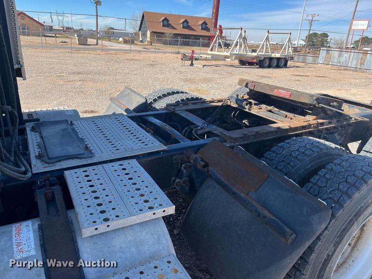 image for item EI0609 2000 Freightliner FLC120 semi truck