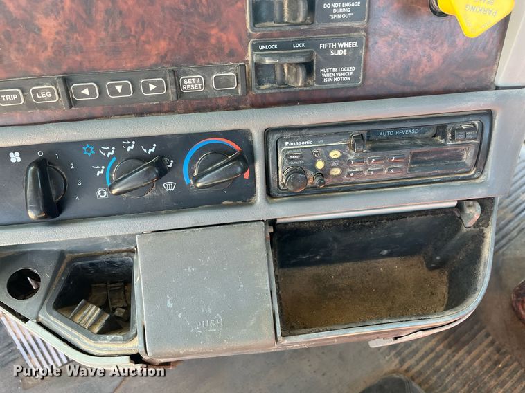 image for item EI0609 2000 Freightliner FLC120 semi truck