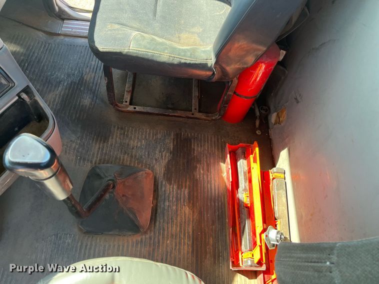 image for item EI0609 2000 Freightliner FLC120 semi truck