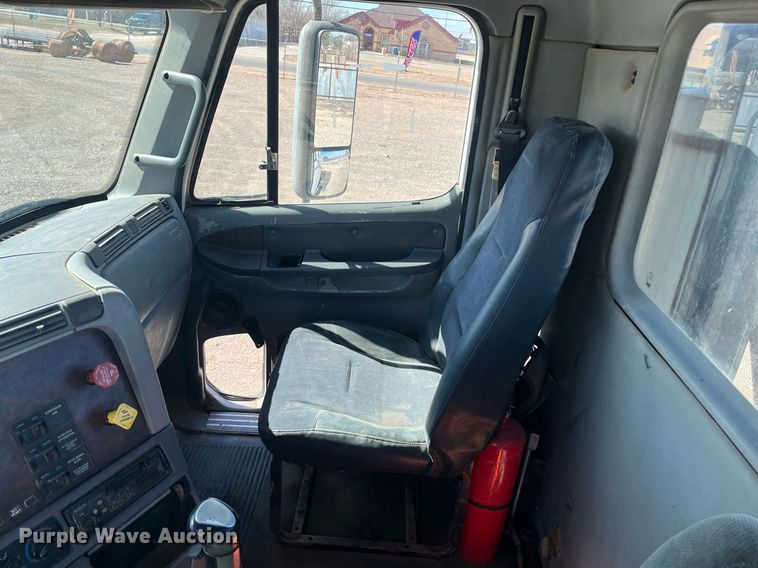 image for item EI0609 2000 Freightliner FLC120 semi truck