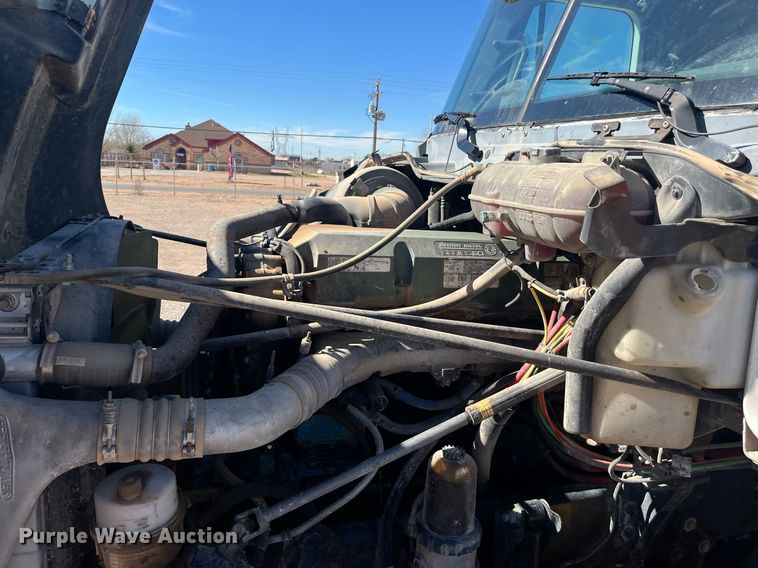 image for item EI0609 2000 Freightliner FLC120 semi truck