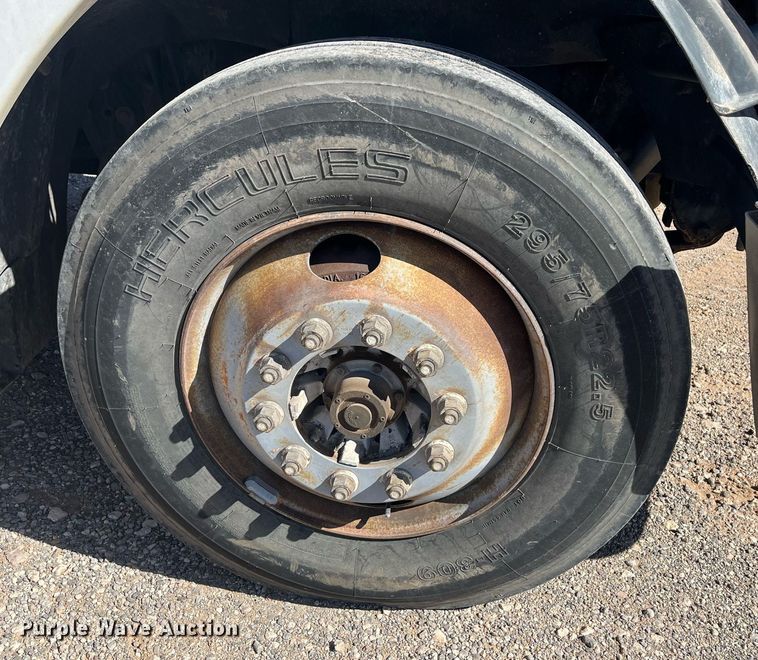 image for item EI0609 2000 Freightliner FLC120 semi truck