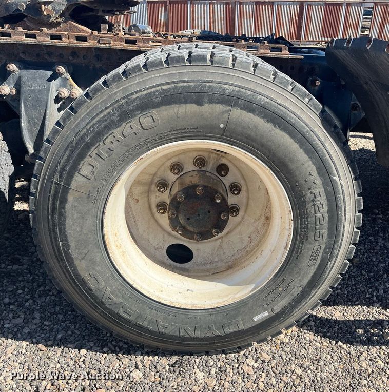 image for item EI0609 2000 Freightliner FLC120 semi truck