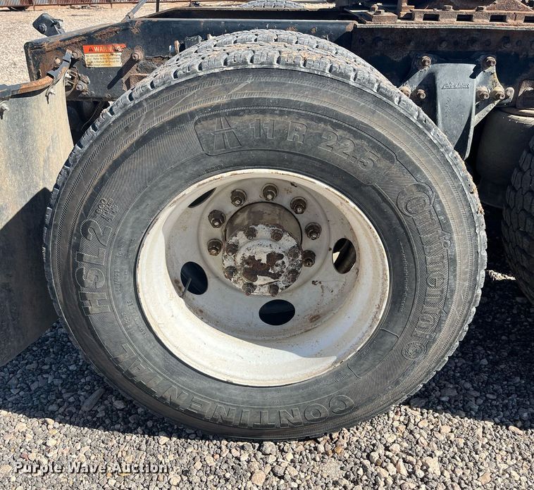 image for item EI0609 2000 Freightliner FLC120 semi truck