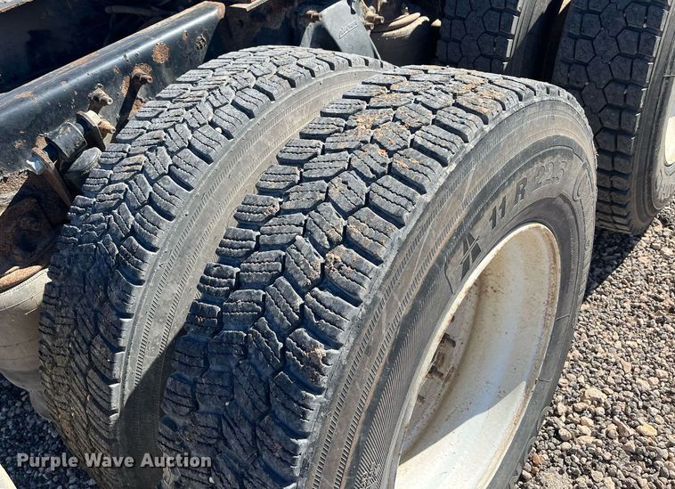 image for item EI0609 2000 Freightliner FLC120 semi truck