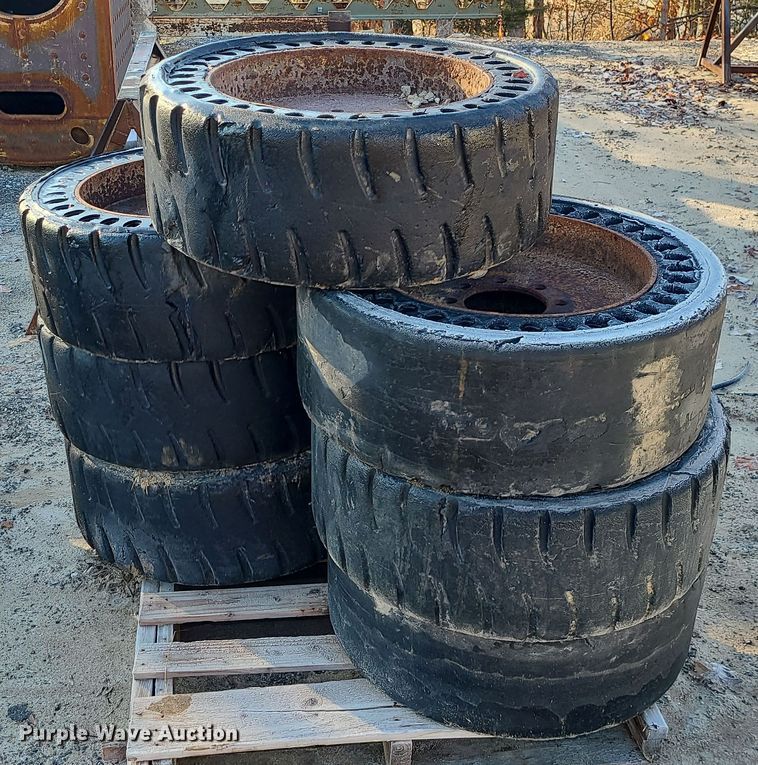 (7) solid skid steer tires and wheels in Odessa, MO Item DN8313 for