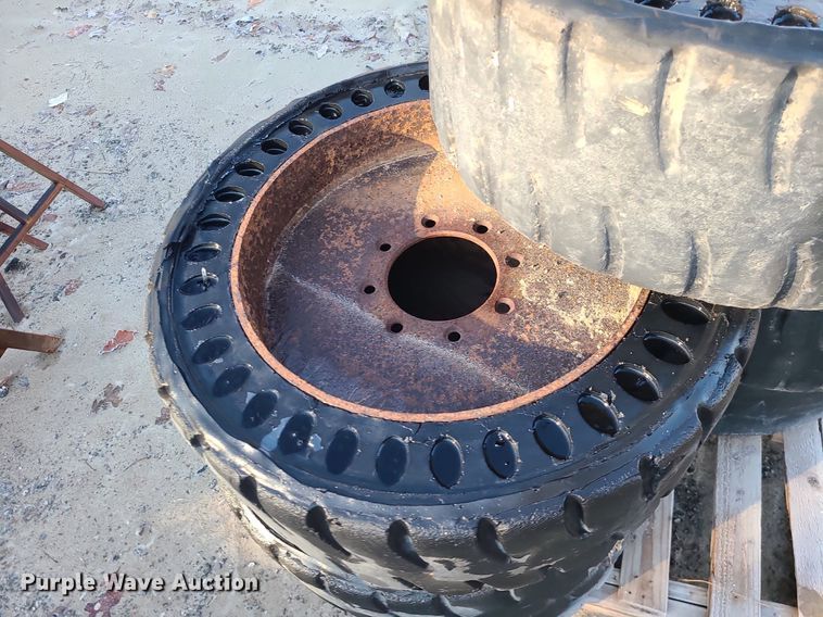 image for item DN8313 (7) solid skid steer tires and wheels