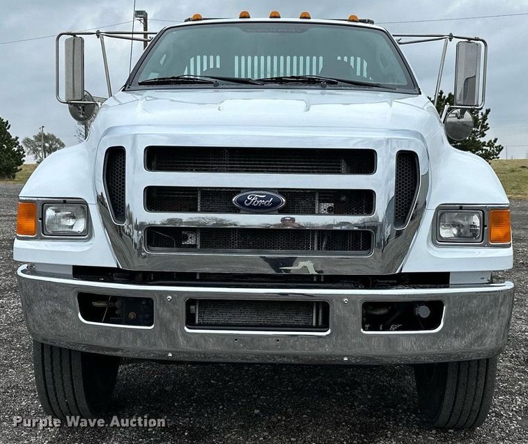 image for item KH9661 2013 Ford F750 Super Duty rollback truck