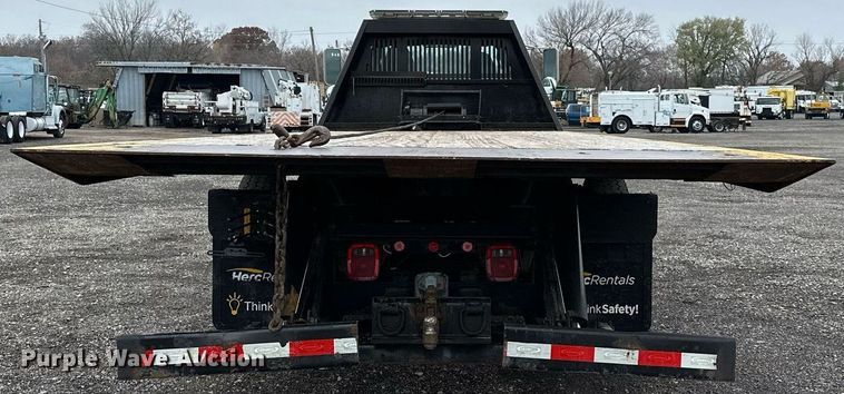 image for item KH9661 2013 Ford F750 Super Duty rollback truck
