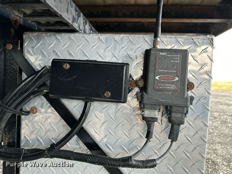 image for item KH9661 2013 Ford F750 Super Duty rollback truck