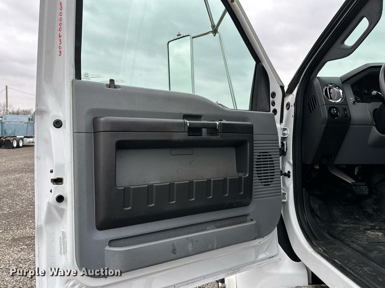 image for item KH9661 2013 Ford F750 Super Duty rollback truck