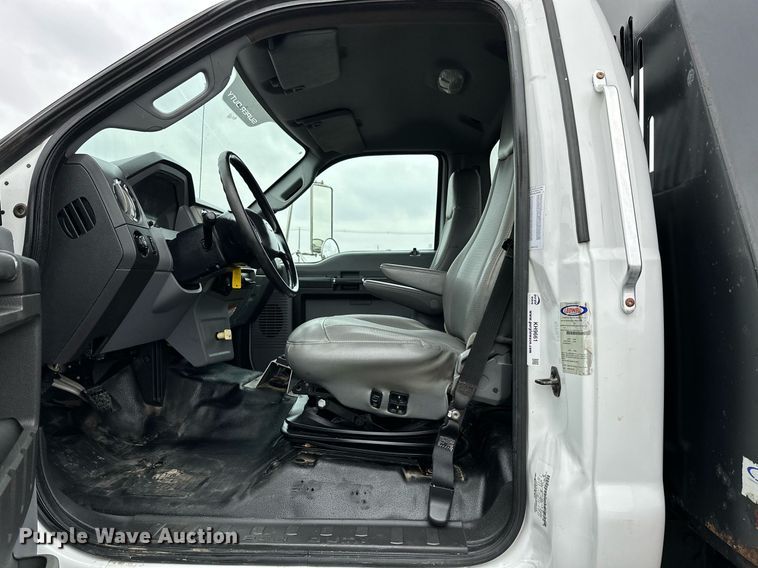 image for item KH9661 2013 Ford F750 Super Duty rollback truck