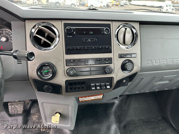 image for item KH9661 2013 Ford F750 Super Duty rollback truck