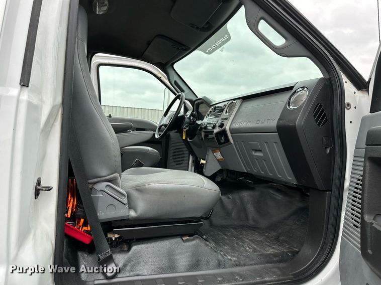 image for item KH9661 2013 Ford F750 Super Duty rollback truck