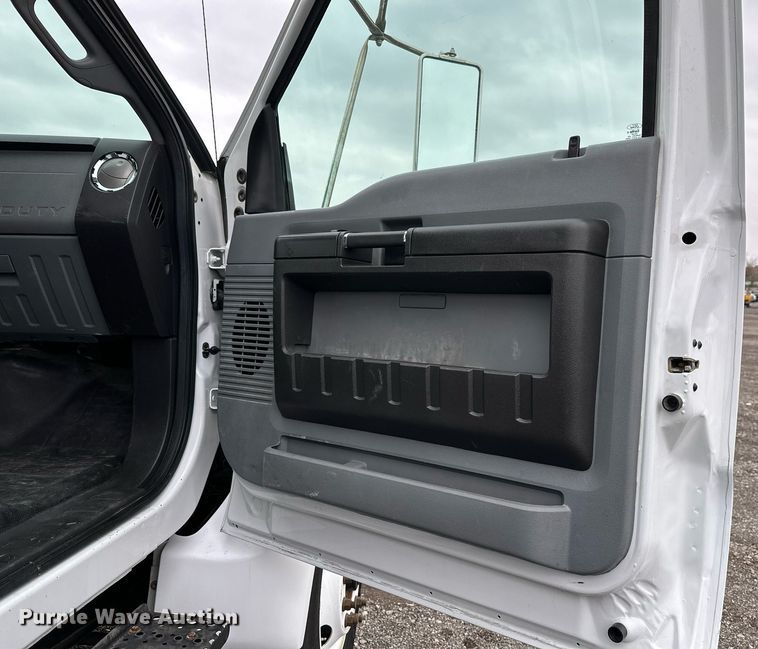 image for item KH9661 2013 Ford F750 Super Duty rollback truck