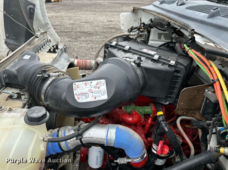 image for item KH9661 2013 Ford F750 Super Duty rollback truck