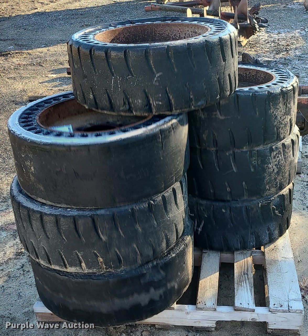 (7) solid skid steer tires and wheels in Odessa, MO Item DN8313 for sale Purple Wave