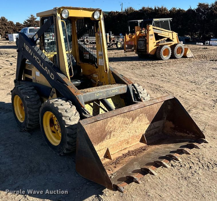 image for item EK9985 New Holland L555 skid steer loader