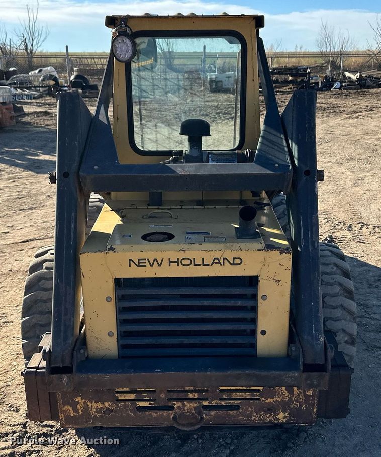 image for item EK9985 New Holland L555 skid steer loader