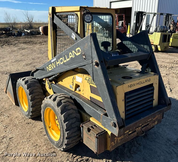 image for item EK9985 New Holland L555 skid steer loader
