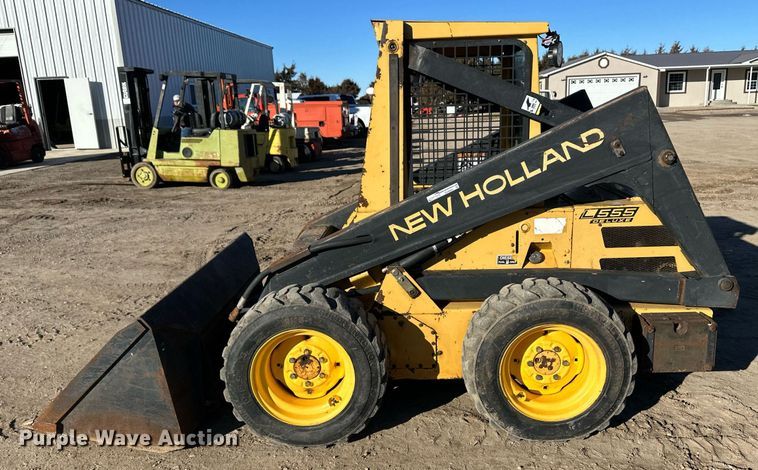 image for item EK9985 New Holland L555 skid steer loader
