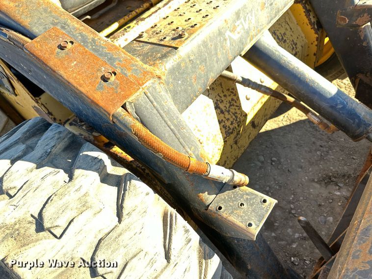 image for item EK9985 New Holland L555 skid steer loader