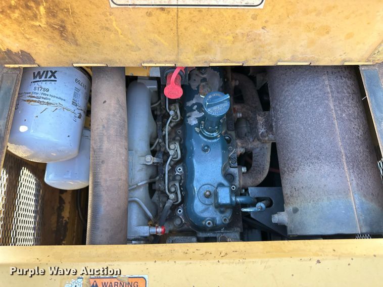 image for item EK9985 New Holland L555 skid steer loader