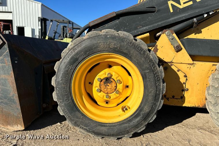 image for item EK9985 New Holland L555 skid steer loader