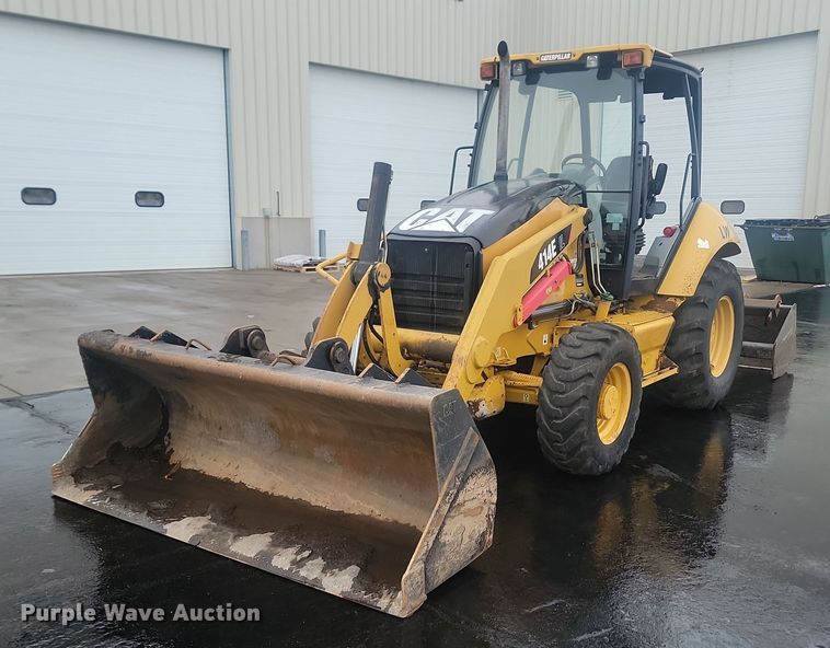 image for item LA9560 2008 Caterpillar  414E IL landscape tractor