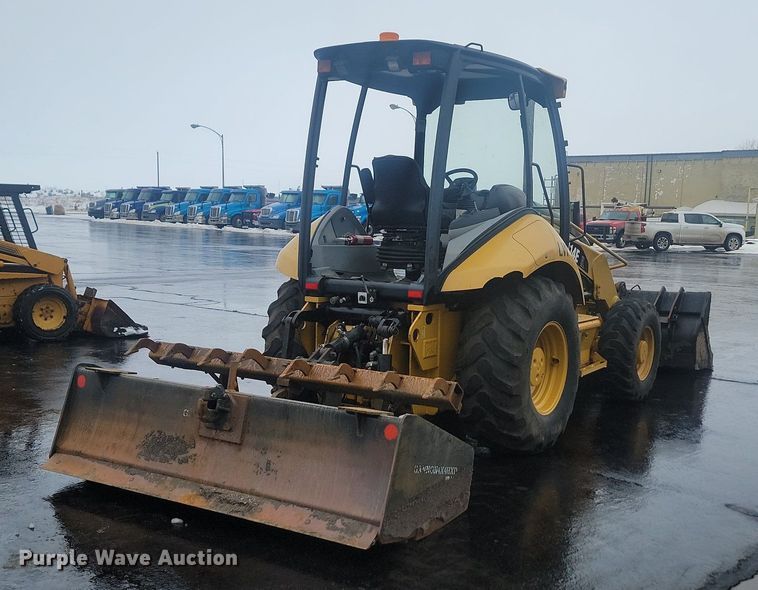 image for item LA9560 2008 Caterpillar  414E IL landscape tractor