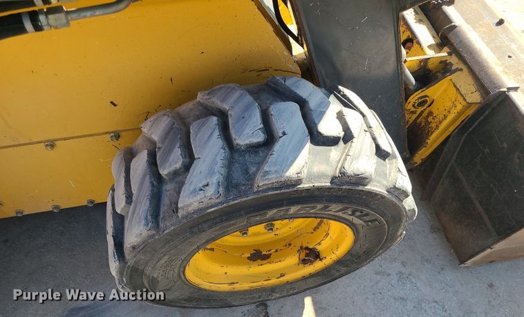 image for item MQ9601 2012 John Deere  326D skid steer loader