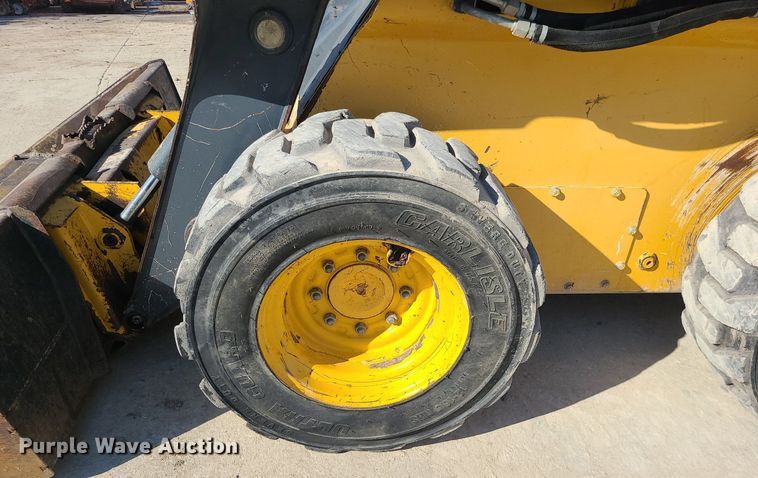 image for item MQ9601 2012 John Deere  326D skid steer loader