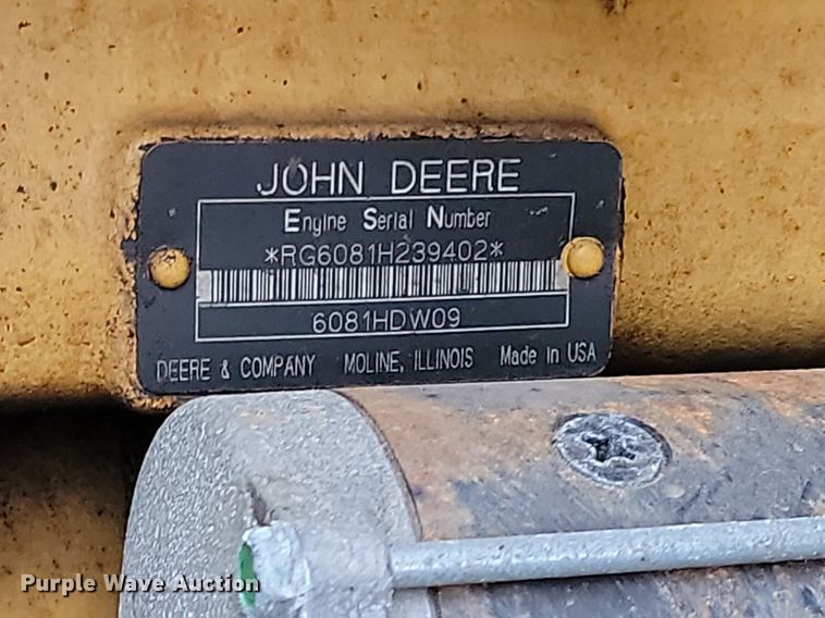 image for item LA9646 2004 John Deere 724J wheel loader