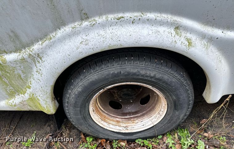 image for item NA9780 2009 Ford E450 Super Duty  shuttle bus