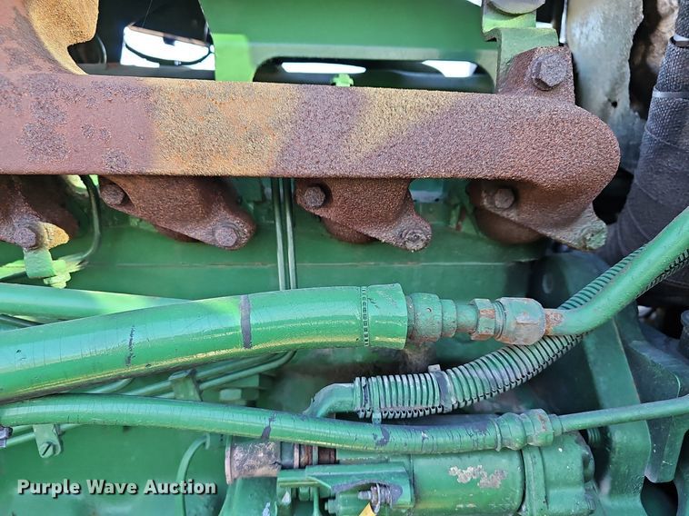 image for item DM1501 1993 John Deere  7600 MFWD tractor