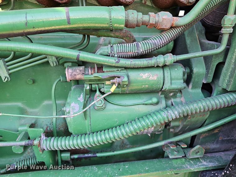 image for item DM1501 1993 John Deere  7600 MFWD tractor