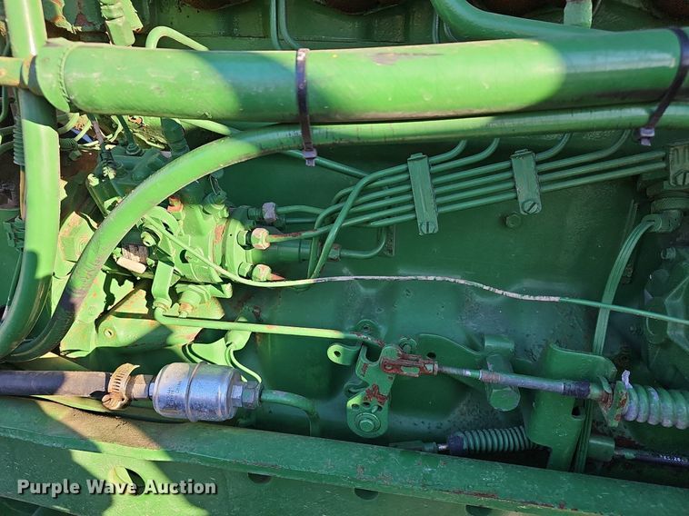 image for item DM1501 1993 John Deere  7600 MFWD tractor