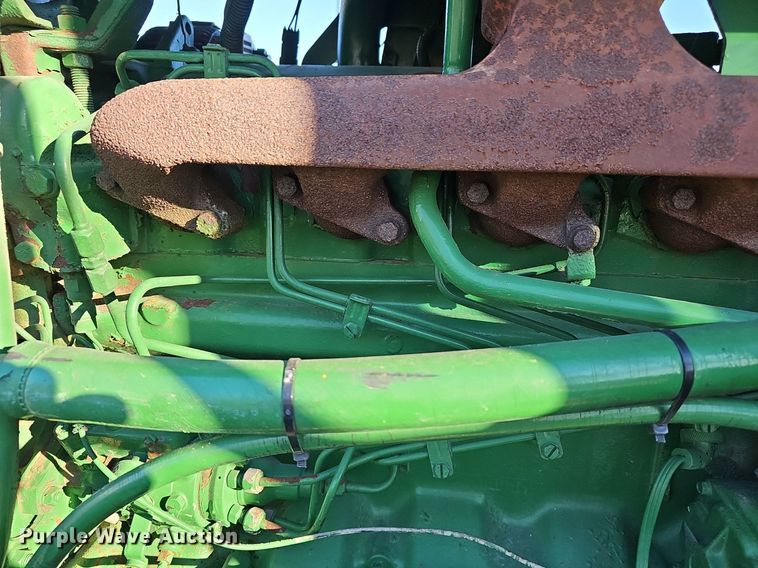 image for item DM1501 1993 John Deere  7600 MFWD tractor